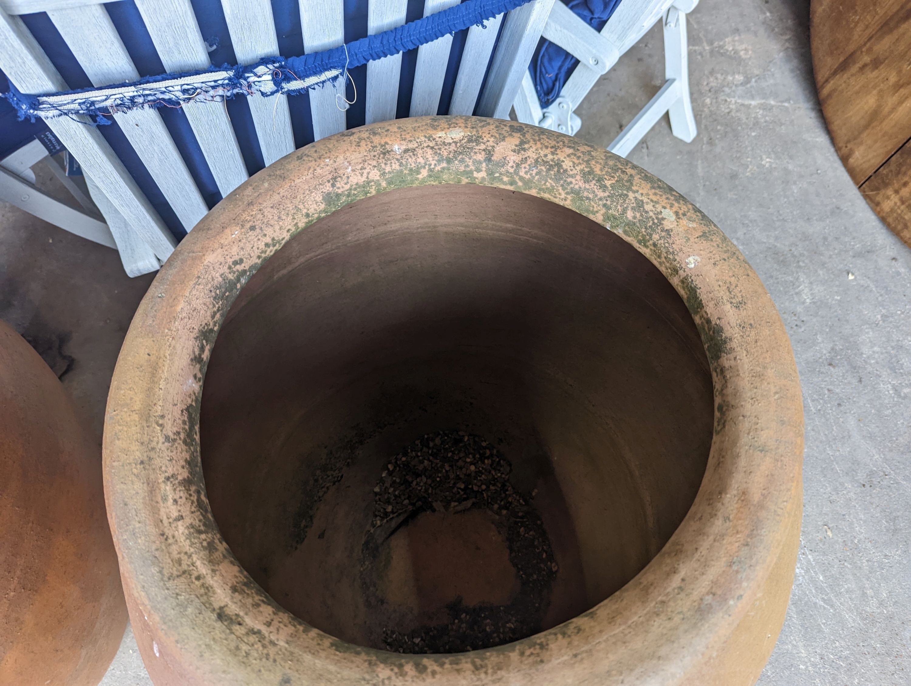 A pair of large terracotta garden planters, height 88cm